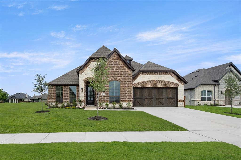 MLS# 21260320 - Built by Risewell Homes - Ready Now! ~ This thoughtfully designed single-story home in Midlothian offers a spacious and inviting layout perfect for modern living. At the heart of the home, the open-concept kitchen flows seamlessly into the breakfast area and family room, creating a bright and connected space ideal for gathering and entertaining. A striking electric fireplace anchors the family room, adding warmth and style. The private primary suite is tucked away for comfort and relaxation, featuring a spa-like bath with dual vanities, a soaking tub, separate shower, and an oversized walk-in closet. Three additional bedrooms are conveniently located near a full bath, while a well-placed powder bath provides extra convenience for guests. A dedicated study off the foyer offers the perfect setting for a home office or quiet retreat, and the functional utility room and two-car garage add everyday practicality. With a welcoming front porch and a layout designed for both comfort and flexibility, this home is beautifully suited for the way you live today.