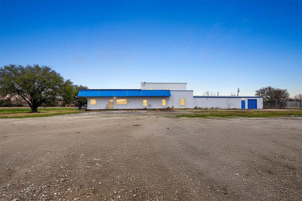 A 9,874 square-foot office-warehouse flex space in Greenville, TX. This property includes two warehouse areas, a reception area, private offices, cubicle space and-or a conference room, and three restrooms. The site also features a second story with two additional office or storage spaces. Additionally, the property is equipped with 3-phase heavy power and is set up for HVAC, though the condition of the current units is unknown. Situated on 1.70 acres, the site offers ample gravel parking and allows for outdoor storage, with the rear of the property fully fenced. Zoned Light Industrial, the property supports a variety of potential uses and is conveniently located just off Exit 97 on Interstate 30 East.