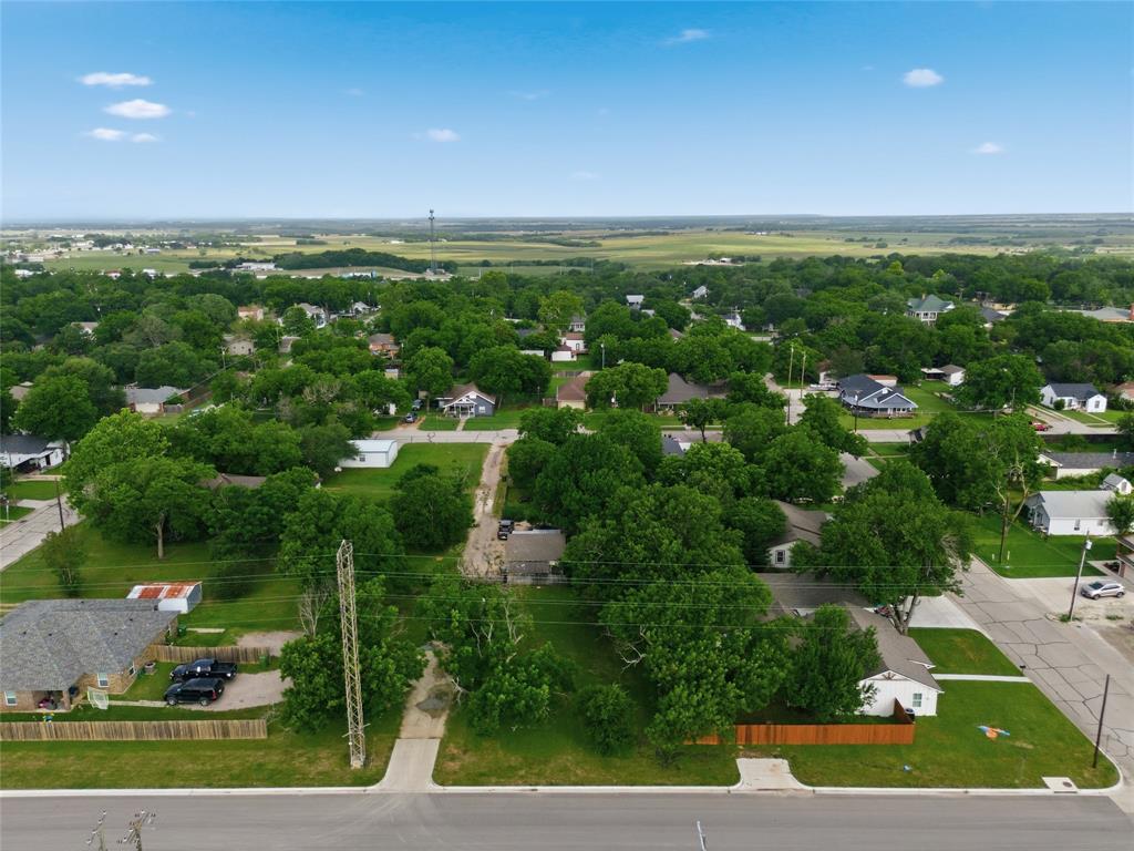 Build your dream home on one of the few remaining vacant lots in the heart of West, TX. Tucked into a well-established neighborhood filled with mature shade trees, this rare city lot offers the perfect blend of small-town charm and everyday convenience. With alley access and approximately 0.138 acres, there is plenty of room not only for your new home, but also a future shop, pool, or outdoor living space. Enjoy a highly walkable location close to West City Park and West ISD schools, while remaining minutes from local restaurants, shopping, and all the amenities of this growing community. Commuters will appreciate the quick and easy access to I-35 for travel to Waco, Hillsboro, and beyond. No HOA. Bring your own builder and create the home you've been dreaming about. Opportunities like this are becoming increasingly hard to find within the city limits of West. Don't miss your chance to secure one of the last remaining homesites in this desirable location.
