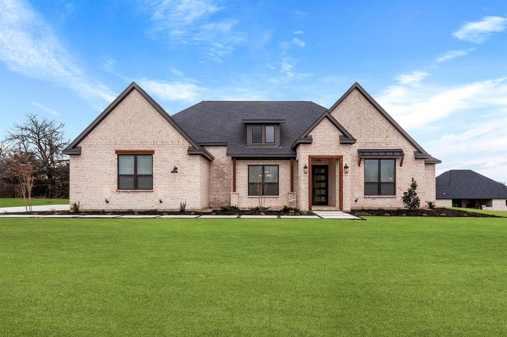 The Woodlands provides homeowners with premium upgrades and finishes, included Kitchen-Aid kitchen appliances, and dining, shopping, and recreational activities all close by. With the top-rated Aubrey ISD schools, low taxes, and no HOA – The Woodlands offers the best value in Denton County. The beautiful Bradley floorplan features three-bedrooms, two-and-a-half-bathrooms, and well designed 3,042 SQFT of space. This floor plan unites the kitchen, breakfast area and family room. Inside the kitchen, homeowners will love the quartz countertops, designer cabinetry, and oversized pantry. The primary bedroom features an en-suite bathroom with expansive vanities, standalone tub, walk-in shower, linen closet and sizable walk-in closet with direct access to the laundry room. In the backyard, the covered patio features an outdoor kitchen with counterspace, a sink and a grill.