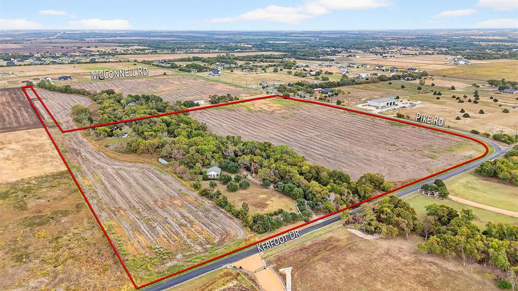 Located at the northwest corner of Kerfoot Road and Pike Road, this remarkable 40± acre property offers an ideal location, easy access, and significant growth potential. With paved road frontage on two sides, it ensures flexible entry and exit points along with excellent visibility for future projects. Nearby utilities make it versatile for a range of uses, including residential neighborhoods, commercial ventures, or mixed-use developments, pending necessary approvals. The open land provides plenty of room for planning and future improvements as the area continues to grow. It's a great opportunity for developers and investors looking for acreage in the thriving North Texas corridor.