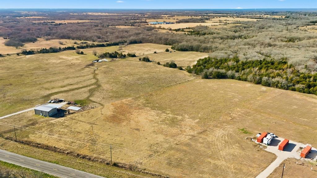 This unrestricted 18-acre tract offers the rare combination of freedom, beauty, and convenience. Tucked away in a quiet setting yet just 20 minutes from Greenville and about an hour from Dallas, the property gives you the perfect balance of country living with city access.

The land itself is a canvas of possibility—open space up front with mature trees toward the back for added privacy, recreation, or trails. With no restrictions, this is the ideal spot to bring your vision to life—whether that’s building your dream home, starting a small ranch, or finally putting up that barndo you’ve been planning. With water and electric available at the road, getting started is simple.

This is your chance to own a generous piece of Texas land with no deed restrictions and all the natural beauty you’ve been searching for.