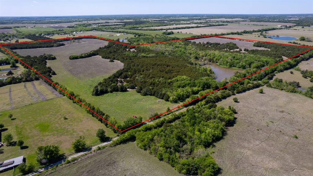 Discover the perfect blend of privacy, beauty, and opportunity with this breathtaking 101.5-acre tract that has remained in the same family since the 1940s. Conveniently located just approximately 5 miles from Highway 121, this remarkable property offers the peace of country living while still providing quick access to nearby amenities, growth corridors, and major travel routes.

The land features a diverse landscape with rolling open pasture, mature trees, scenic views, and two beautiful, stocked ponds that create the perfect setting for fishing, wildlife, recreation, or simply enjoying the outdoors. Whether you’re searching for a private family ranch, recreational retreat, future homesite, cattle property, or long-term investment opportunity, this property offers endless potential.

Adding to its appeal, approximately 30 acres are located within Blue Ridge ISD, while the remaining 71.5 acres are within Trenton ISD, offering flexibility and future possibilities. With the rapid growth occurring throughout the area, this property presents an outstanding opportunity for both enjoyment today and investment for tomorrow.

Rarely does a property of this size, location, and beauty become available. Bring your vision and make this incredible North Texas ranch your own.