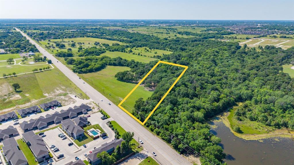 Price Improvement! Opportunity doesn’t knock like this very often. 5.2± acres positioned on high-traffic FM 1570—one of Greenville’s most visible and active corridors—offering a rare chance to secure land with serious upside in a rapidly developing area. Currently zoned Agricultural, this tract presents strong potential for rezoning to accommodate Retail, Commercial, Medical, Office, Residential, or Multi-Family use (subject to city approval). With flexible acreage options, the seller is open to conveying more or less land to fit your project vision and pricing structure. Surrounded by major drivers including L-3 Harris, Oak Creek Country Club & Golf Course, and nearby schools, the location delivers built-in traffic, visibility, and long-term demand. Frontage along FM 1570 provides excellent exposure and accessibility—ideal for commercial or mixed-use development. A portion of the property lies within a floodplain, creating opportunities for strategic site planning, green space, or creative development solutions. Whether you’re a developer, investor, or business owner looking to secure a footprint in one of Greenville’s most traveled areas, this property offers location, flexibility, and future growth potential—all in one powerful package.