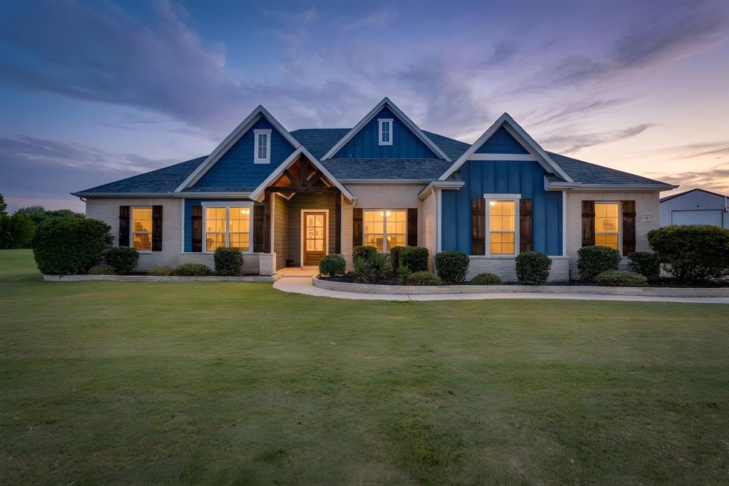Resort-style living awaits in this beautifully upgraded home, where luxury meets everyday comfort. The backyard is an entertainer's dream, featuring a sparkling saltwater pool with a tanning ledge, a covered patio with an outdoor fireplace, and the perfect space to relax or host family and friends year-round.

Step inside to discover hand-scraped hardwood floors, soaring ceilings, abundant natural light, and an open-concept floor plan designed for modern living. The gourmet kitchen is the centerpiece of the home, showcasing elegant quartz countertops, ample cabinetry, and a seamless flow into the spacious living and dining areas. Granite countertops add a touch of sophistication to every bathroom.

The thoughtfully designed split-bedroom layout offers privacy, while the dedicated home office with French doors provides an ideal space for remote work or a quiet retreat. The spacious primary suite features dual vanities, a large walk-in closet, and a spa-like atmosphere designed for relaxation.
Practical upgrades continue with a well-appointed laundry room complete with built-in cabinetry and a folding counter, plus an oversized three-car garage featuring built-in shelving for exceptional storage and organization.

Additional exterior amenities include extended parking, landscape lighting, rain gutters, and a 30-amp RV hookup, making this home as functional as it is beautiful.

From the resort-style backyard to the premium finishes throughout, this home offers the perfect blend of elegance, comfort, and convenience. Don't miss your opportunity to make it yours!