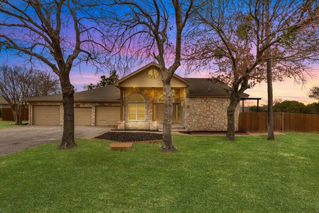 Welcome to 4017 Marana Drive — a fully remodeled home from top to bottom offering exceptional space, flexibility, and everyday comfort. This 2,892 square foot property sits on an oversized lot in the beautiful Indian Harbor community and features 5 bedrooms, including a room ideal for a guest suite, mother-in-law suite, or second-generation living space, along with 3.5 bathrooms. The versatile layout is designed for comfortable everyday living with room to spread out. The home offers a large main living room and an oversized family room, providing multiple spaces for relaxation or quiet evenings at home. The fully remodeled kitchen features beautiful cabinetry, abundant counter space, and an open-concept design that flows seamlessly into the living areas. Recent updates include all new windows, two brand-new HVAC systems (inside and out), new insulation in all walls, drywall, electrical wiring as needed, doors, hardware, switches, blinds, flooring, and granite countertops. Every detail has been thoughtfully updated, making this home truly move-in ready. Outside, the property continues to impress with a 30x38 shop offering RV parking and enough height to accommodate a vehicle lift if desired, plus a separate storage building for added convenience. Enjoy an outdoor deck and spacious yard designed for everyday enjoyment and relaxation. Located just minutes from Lake Granbury, this home sits within the gated and guarded Indian Harbor community, offering amenities such as a marina, boat ramp, clubhouse, community pool, park, playground, and more. This property offers a rare combination of extensive renovations, versatile living spaces, exceptional outdoor amenities, and close proximity to the lake — all within a highly sought-after community. Come see all that this exceptional home has to offer and make it your next move.