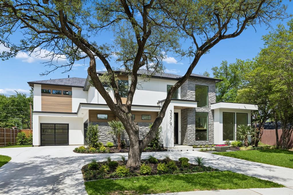 Fresh & Fantastic! Come see what sets Laguna Homes above the rest. This second generation home builder delivers the 'WoW' factor with quality construction and luxury finishes.  Come experience the coastal aesthetic and bonus amenities that differentiate this house from the rest.  The new owner will appreciate the oversized backyard and fully landscaped front yard; covered patio prepped for motorized mosquito screens; oversized 3-4 car garage plus additional parking in the circle drive. An open plan featuring lofty ceilings and generous windows fills the interior with natural light. Off the kitchen is a flex-space that can be transformed into a room that serves YOUR LIFESTYLE.  Imagine having a FIRST FLOOR MEDIA ROOM - play room - gym, library, studio or a living area adjacent to the guest suite. The possibilities are endless and make this a multi-generational house that grows and evolves for your whole family to enjoy. Other luxury amenities include with high-end finishes & appliances that make this house a true stand-out! The entry is adorned with an impressive floating stair with glass railings, large art walls, a glass enclosed wet bar and a dramatic, modern chandelier.  Once embellished with art, the entry will be a showcase for the owners to express their personality and style!  Upstairs, the game room features it's own kitchenette, plenty of natural light and a glass railing overlooking the great room down stairs. Three ensuite bedrooms, each with a spacious closet, open to the game room.   Back on the first floor, there are 2 attached garages. Ask agent about the potential car lift that enables  garage parking for 4 vehicles.