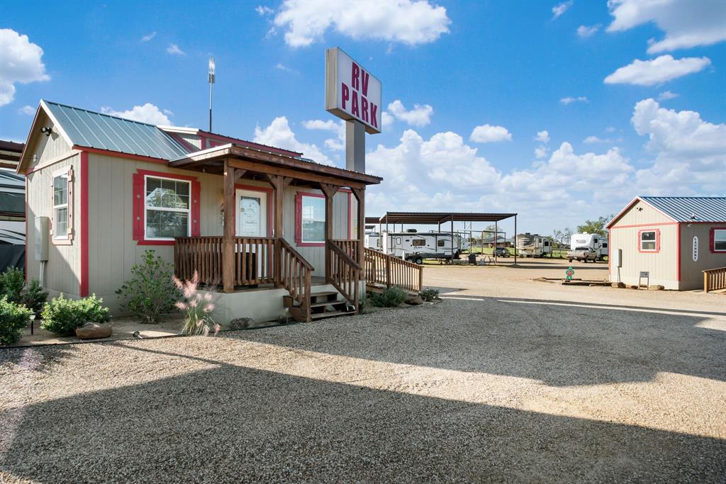 Brand NEW RV Park located off of the highly traveled HWY180 in Parker County! Construction completed in Nov 2023. Park Consists of 95 RV Sites including 46 covered and 49 uncovered sites situated on 14.5 acres. An additional 5.5 acres included in sale could be used to expand or possibly used for a horse type facility!   Amenities include a sparkling pool, 1000sf community center, fenced dog park, fenced playground, 100sf office and a 250sf laundry room and shower house.  All RV sites are individually metered with full hook ups with 30 and 50 amp service, water and sewer. Tenants pay for 100% of their electric. All roads and RV sites are chip sealed and all sites include a grassy side yard.   Park is currently 67% occupied as construction was recently completed. Golf Cart and zero turn will be included as well as furnishings and park owned RV which is currently rented to a guest. Park currently does have a property manager and maintenance tech on site. Pro-forma and Survey Available.