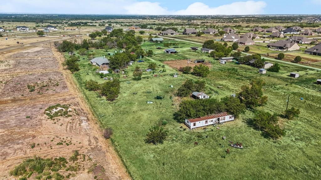 15-Acre Development Opportunity. Argyle ISD. Northlake, TX. Prime acreage. Premier schools. Endless opportunity.

Discover a rare 15-acre tract at 7331 Faught Road in Northlake, located in highly desirable Argyle ISD. This versatile property offers exceptional potential for residential development, land investment, a custom estate, or small commercial or industrial use (buyer to verify zoning). Tucked away from the hustle, the land delivers peaceful seclusion, wide-open space, and stunning sunset views, while remaining close to major growth corridors in North Texas.

The property includes an existing residence and multiple outbuildings, providing flexibility for rehab, redevelopment, or interim use. Ideal for builders, developers, investors, or visionaries seeking acreage in a rapidly expanding area.

Sold AS IS. Seller is an Estate. Recent survey is available in the MLS under Transaction Desk (TD). DentonCAD images show approximate boundaries. Buyers to perform all due diligence regarding property lines, zoning, land use, utilities, and taxes. If represented, BUYER AGENT MUST SHOW PROPERTY.