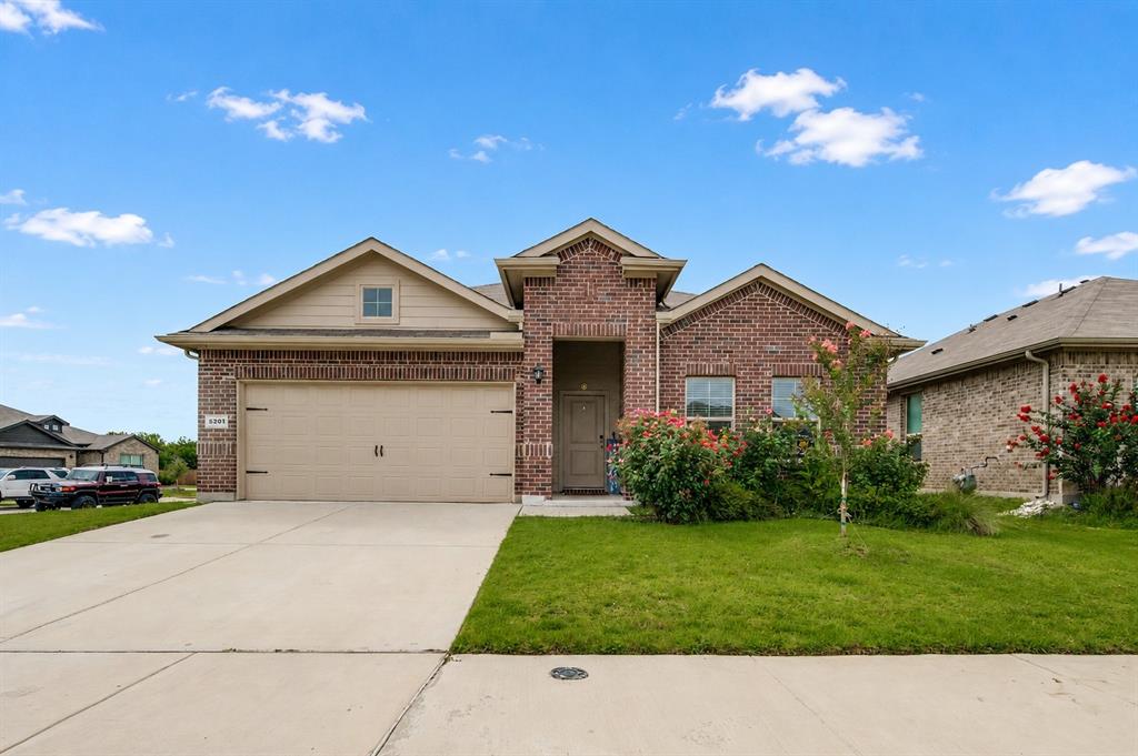 Welcome home! From the moment you arrive, you'll feel right at home in this beautifully maintained corner-lot home. The bright, open floor plan is designed for both everyday living and entertaining, with plenty of natural light and a seamless flow between the living room and kitchen. At the heart of the home, the kitchen features granite countertops, white cabinetry, stainless steel appliances, a walk-in pantry, and a large island that's perfect for family meals, homework, or gathering with friends. The spacious primary suite offers a walk-in shower, oversized vanity, and generous walk-in closet. Step outside and discover what truly sets this home apart is a HUGE COVERED PATIO that stretches across nearly the entire back of the house. With beautiful wood beams and multiple ceiling fans, it's the perfect place to enjoy your morning coffee, host weekend BBQs, watch the game, or simply relax in the shade. The fully fenced backyard also features a large deck and plenty of space for kids, pets, and outdoor fun. Located just minutes from Eagle Mountain Lake, parks, walking and biking trails, shopping, restaurants, and everyday conveniences, with easy access to Loop 820 and I-35W, this home offers the perfect blend of comfort, convenience, and outdoor living. Don't miss your chance to make this wonderful home yours.  Call today to schedule your private showing!