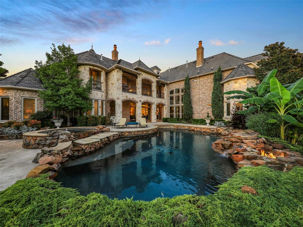 Impressive Custom Home on corner lot in highly sought-after Lakeside on Preston has it all! Stunning island kitchen with high end appliances overlooks the spacious family room with dramatic floor-to-ceiling stone fireplace. Walk out & enjoy the resort style pool with custom built fireplace, built-in grill & fire pit or soak in the view from one of the two balconies that overlook all that beauty. Enjoy entertaining upstairs in the expansive game room with wet bar while you have 3 games going at once in the media room. Retreat to the master suite with luxurious master bath & huge walk-in closet. 4 secondary bedrooms all with ensuite baths, handsome study & gym with pool bath complete this warm and inviting home.