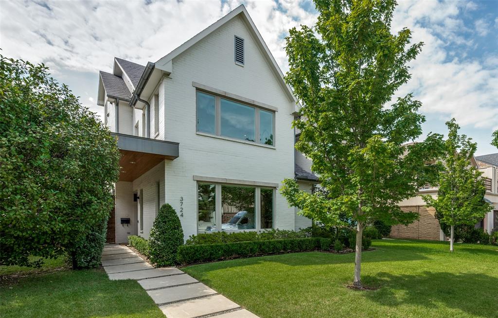 This exceptional single-family attached home, built in 2018 and ideally situated on West Beverly Drive, offers timeless design, modern comfort, and effortless lock-and-leave living in one of Dallas' most walkable neighborhoods. Filled with natural light, the open-concept floor plan features soaring ceilings, white oak flooring throughout, and seamlessly connected living spaces designed for both everyday living and entertaining. The home offers four generously sized bedrooms, each with its own en-suite bath and walk-in closet, providing comfort, privacy, and flexibility. At the heart of the home is a beautifully appointed kitchen featuring a large island, premium stainless steel appliances, gas cooktop, double ovens, and abundant storage, all flowing effortlessly into the spacious living and dining areas. Two inviting outdoor living spaces enhance the home's appeal, including a private covered patio with low-maintenance turf and a rooftop terrace with expansive views, perfect for relaxing, entertaining, or enjoying sunset evenings. Additional highlights include an oversized attached two-car garage with epoxy flooring and an EV charging outlet, smart thermostats, a smart security system, and significant recent mechanical updates, including a Navien tankless water heater and Lennox HVAC system, both replaced in 2025. With no HOA fees and meticulous maintenance throughout, this residence offers a rare combination of style, convenience, privacy, and low-maintenance living in a premier Dallas location.
