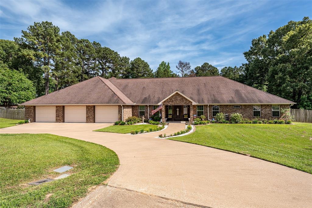 Spacious and beautifully maintained, this custom one-owner home offers the perfect blend of comfort and functionality on a full acre just minutes from South Tyler and Lake Palestine. Featuring 4 bedrooms, 3 baths, and a 3-car garage complete with a shop and an extra-deep bay ideal for boat storage, this property is designed to fit a variety of lifestyles. Inside, you’ll find large bedrooms, tons of storage, a dedicated office, and a versatile flex space with a pool table that can also serve as a second living area. The main living room showcases a vaulted ceiling and cozy fireplace, flowing seamlessly into the dining area conveniently located between the living space and kitchen—perfect for everyday living and entertaining. The kitchen is well-equipped with stainless appliances, including a griddle, along with an island, pantry, solid surface countertops, and an abundance of cabinetry, all complemented by windows overlooking the backyard. Enjoy outdoor living year-round on the large screened-in porch overlooking two garden areas and the expansive yard. A circle drive adds both convenience and curb appeal, while the home’s immaculate condition inside and out makes it truly move-in ready. Come See! Come Buy