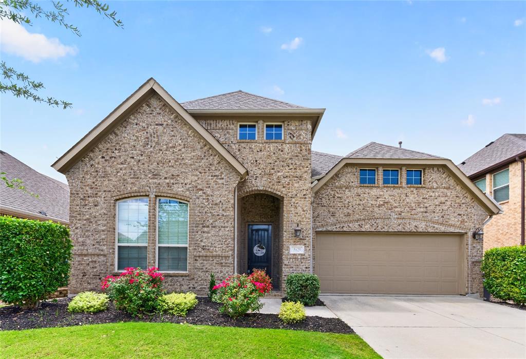 This beautifully designed K. Hovnanian Home is located in the desirable Heatherwood community and zoned to highly sought-after Prosper ISD.  The home features the ideal floor plan with four bedrooms and three bathrooms thoughtfully laid out: Both the primary suite and a guest bedroom with full bath are on the main level, and the upper level offers two other bedrooms and a full bath, along with a media room and a game room providing flexible space for every day use and entertainment.  The spacious primary suite serves as a true sanctuary with bay windows, gorgeous primary bath with separate shower and tub, dual sinks and an oversized walk-in closet. This move-in ready home also features wood-flooring, an open-concept plan, vaulted ceilings, cozy fireplace in the spacious living room.  Enjoy cooking in the gourmet kitchen with stainless steel appliances, granite countertops, center island overlooking the living room, gas cooktop, and lots of beautiful cabinetry.  Downstairs also includes a formal dining room with upgraded light fixture, a breakfast nook, and an oversized utility room. The quiet backyard has a covered patio ideal for relaxing and entertaining.  Heatherwood offers resort-style amenities such as a community pool, parks, trails and more. Prime McKinney location with easy access to 75, 380, Costco, Target, lots of restaurants and shopping. COME CHECK IT OUT this meticulously maintained home designed to impress!