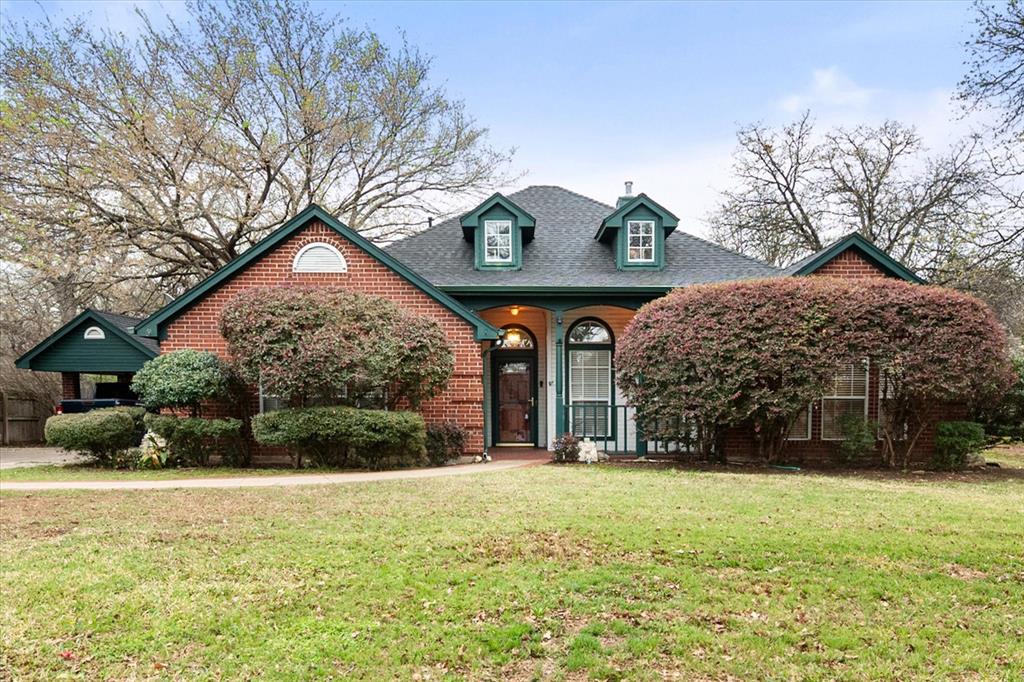 Check out this custom home on quiet culdesac in the heart of Arlington.  Protected by many shade trees this charmer features huge living room with a double sided fireplace that warms and makes cozy the primary bedroom as well.  In the primary, enjoy his and hers walk in closets, a jetted tub and remodeled walk in shower.  Two more spacious bedrooms are located on the opposite side of the home.  All have large closets.  One room could be an office. The kitchen has lots of prep space, a gas stovetop and ample cabinet space.  The formal dining is steps away.  To provide more storage, a handy shed sits in the shady backyard, which backs up to a park.  There is extra parking under an additional carport.
