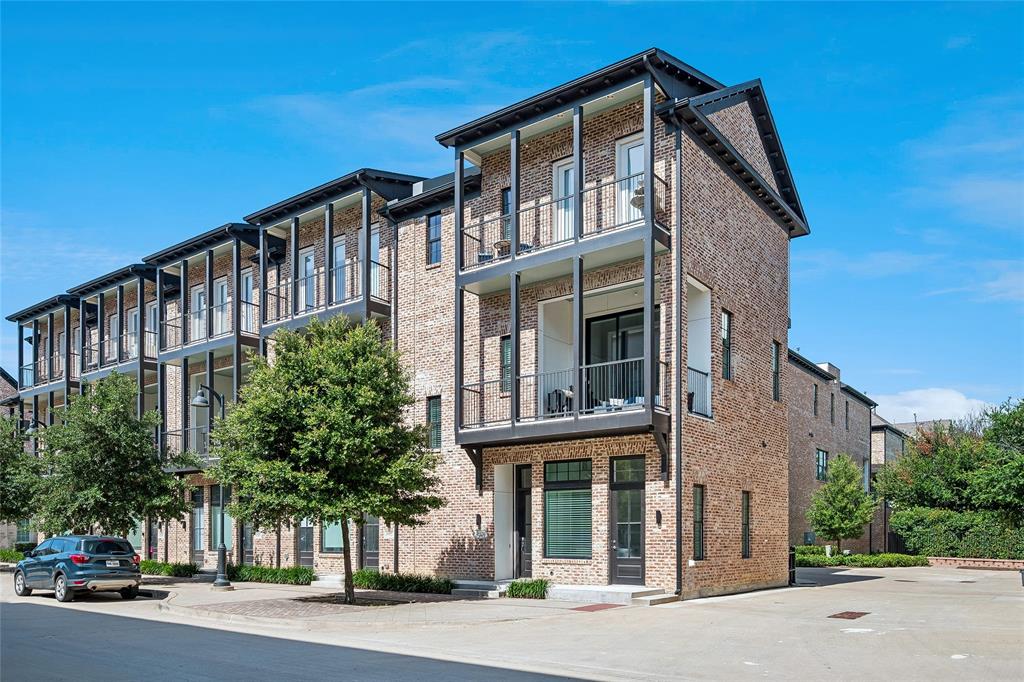 Experience sophisticated urban living in the center of it all at highly sought-after Addison Grove. This exceptional corner-unit work-live townhome offers incredible flexibility with a first-floor suite featuring a private entrance—perfect for a home office, professional workspace, guest retreat, or multi-generational living. Designed with timeless architecture, the home showcases a fully bricked exterior, decorative corbels, dual balconies, Heritage by Andersen 10-foot sliding doors, Andersen aluminum-clad wood windows, and abundant natural light throughout. The expansive second floor is an entertainer's dream, featuring an open-concept living area with sliders open to extended balcony,  oversized island kitchen, engineered hardwood floors, and a premium Bosch appliance package with a 5-burner gas cooktop. A dramatic open staircase connects all three levels, creating an airy contemporary feel while providing the ideal location for a future elevator or lift. The third floor offers a luxurious primary suite with its own private balcony, along with an additional private guest bedroom and bath. Rarely found in a townhome is a full sized laundry room where washer and dryer will remain. Enjoy the ultimate lock-and-leave lifestyle with a two-car garage, small private driveway, and unbeatable walkability to Addison's award-winning restaurants, shopping, parks, miles of walking and biking trails, dedicated bike lanes, and the Addison Athletic Club. Addison residents enjoy membership to the Addison Athletic Club for just a one-time $10 fee, offering exceptional fitness, aquatics, and recreation amenities. Perfectly positioned in the center of it all, this exceptional home offers the ideal blend of luxury, convenience, and an unmatched urban lifestyle.