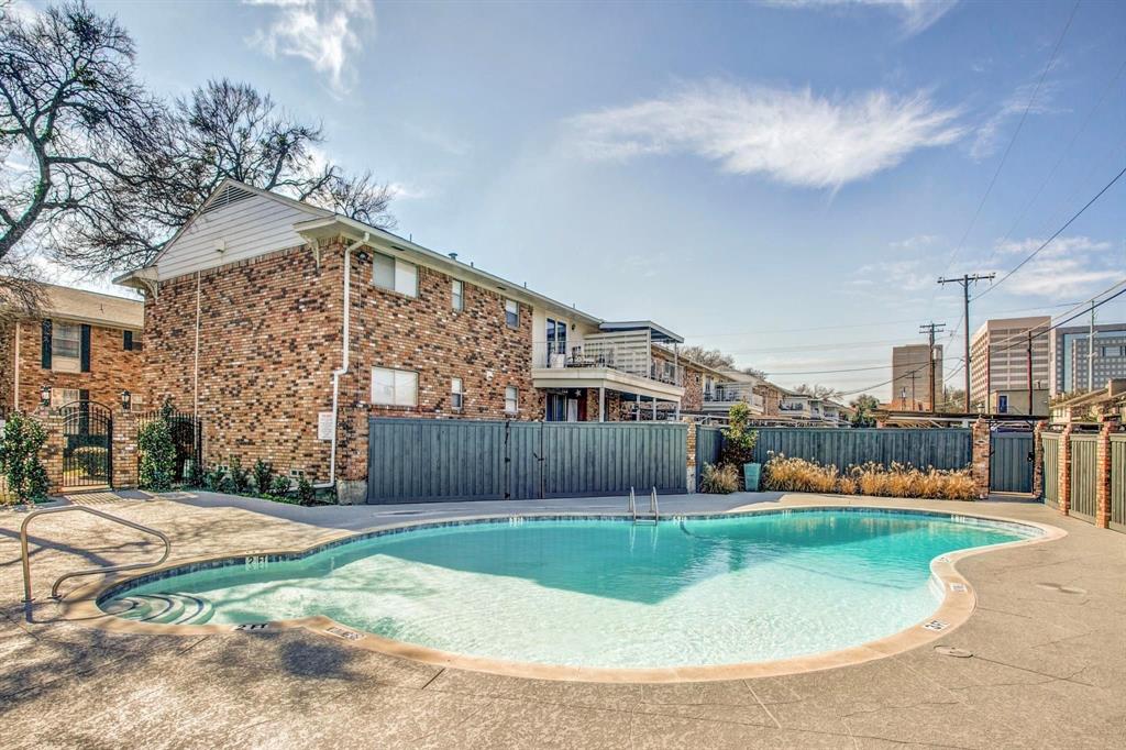 Thoughtfully updated & move-in ready, this spacious top-floor unit offers an ideal blend of comfort, flexibility & location, steps from SMU & Lower Greenville. Featuring an open, versatile layout with multiple living & dining areas—PLUS dual primaries—perfect for roommates seeking a highly flexible floor plan! Freshly repainted (2026) with great natural light pouring in through bay windows enhanced by plantation shutters throughout. The expansive living & dining areas flow seamlessly to a private outdoor balcony through double doors just off the kitchen, which is complete with ample cabinet storage, double ovens & breakfast bar seating. The oversized primary suite includes room for seating, a built-in desk, walk-in closet & ensuite bath, plus new lighting added above the vanity (2026). Secondary bedroom with its own ensuite that is also accessible from the main living areas. Seller has installed electrical outlets in hall closet for future in-unit washer-dryer hookup. Two assigned parking spaces located directly near the rear entrance—a valuable feature in this community. Residents enjoy access to the community pool & clubhouse. Ideally positioned minutes from SMU, Central Market, Greenville Ave shopping & dining—this property offers outstanding livability & investment potential in a central Dallas location!