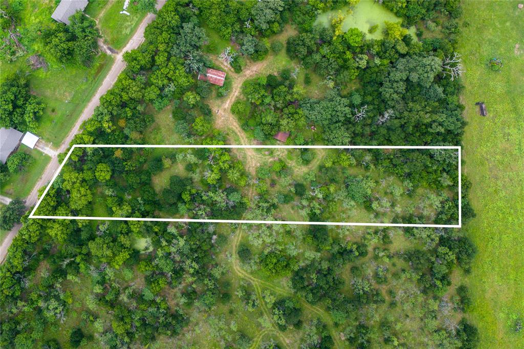 These lots have NO RESTRICTIONS – bring your mobile home, RV, or custom build! These are the lots you've been looking for that are just a stone's throw away from Legion Field (Marlin ISD Stadium), and less than a mile from Walmart and Marlin High School. You're just 25 minutes to Waco and 35 minutes from Temple, located incredibly close to both Highway 6 and Highway 7 for easy commuting. SELLER FINANCING OFFERED!

Each tract offers an incredible variety of mature trees, with some lots featuring pond access or existing improvements. You might be looking for a weekend getaway, a peaceful homestead in the country, or a great investment - let these tracts check your boxes.

Don’t miss out – schedule your visit today and claim your piece of unrestricted Texas land!

Photos for this listing are representative of the entire 30-acre site and not of the specific lot listed for sale. Boundary lines shown are approximate.