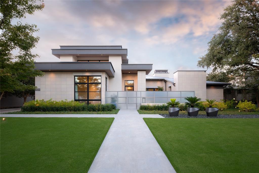 Designed by John Lively and built by the renowned Les Owens of LRO Residential, this masterfully designed home boasts exquisite attention to detail and high end finishes. Floor-to-ceiling glass doors and windows bring the outdoors in, exquisite pool and superb landscape design by Harold Leidner, cozy firepit, and situated on a large lot. The master suite is downstairs and secluded from the rest of the home.  A guest suite, office, and game room are also downstairs.  Upstairs are 3 bedroom suites and a loft living space. Museum finished walls & art lighting add to this comfortable and luxurious home meant for living and entertaining indoors and out.