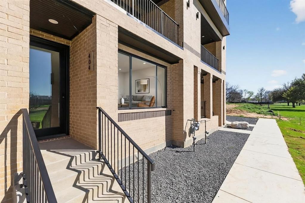 Come see this exceptional opportunity to own a Brand New sophisticated three-story townhome perfectly positioned on the Fort Worth Trinity River. Every morning experience breathtaking panoramic views of the Fort Worth city skyline and the Trinity River. This elegant residence offers 4 spacious bedrooms, 4.5 luxurious baths, and an open-concept floor plan filled with radiant natural light that enhances the modern, airy ambiance throughout. Contemporary finishes and thoughtful design details elevate every room. The living area features a striking color-changing fireplace, creating the perfect atmosphere for both relaxation and entertaining. The expansive owner’s suite also offers breathtaking views—ideal for morning coffee on the covered balcony or evening stargazing. Additional highlights include a short walk to Top Golf, a brewery, e-bike and Trinity Trails, Wi-Fi capability for secure Amazon deliveries, a tankless water heater, and individual high-efficiency HVAC systems on each floor to maximize comfort and energy savings. Elevator-ready with space allocated for future installation. Located in an exciting, up-and-coming neighborhood, this townhome is not only a beautiful place to live but a smart investment for the future. Multiple units for sale. Schedule your private tour today—this is a rare gem!