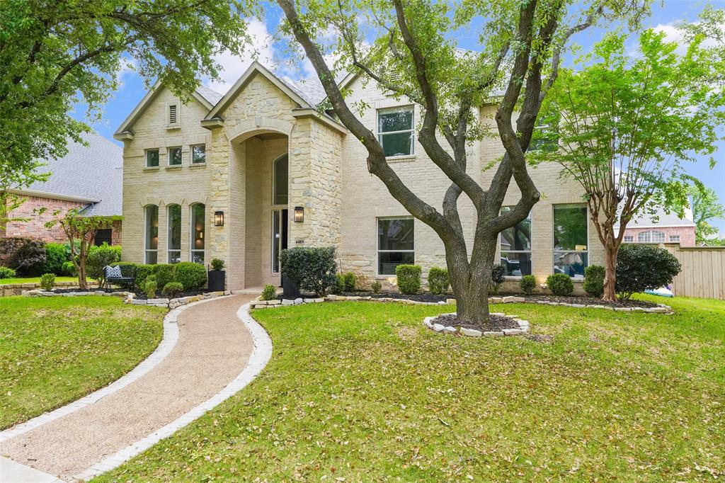 Located in the highly sought-after Lakes on Legacy Drive, this exceptional 5-bedroom, 4-bath home with a 3-car garage offers a rare blend of modern updates, architectural character, and flexible living in the heart of Frisco. From the moment you enter, you’re welcomed by soaring 22-foot ceilings, abundant natural light, elegant crown molding, and a dramatic spiral staircase that creates a stunning focal point. The updated kitchen opens seamlessly to expansive living areas, creating a central hub ideal for entertaining and everyday living, with clean lines, generous workspace, and abundant storage. Designed for today’s lifestyle, the flexible layout features multiple living areas and well-separated bedrooms, making it ideal for multi-generational living, extended guests, or private retreats. The media room with en suite provides the perfect space for guests or teens, while additional rooms can serve as a home office or secondary living area. The luxurious primary suite offers a true escape, highlighted by an incredible custom walk-in closet designed for both function and style. Built for entertaining, the home features a state-of-the-art surround sound system and open sightlines that create a seamless flow throughout. Step outside to a private backyard oasis with a beautiful pool, mature trees, and a serene setting rarely found in Frisco. The 3-car garage offers ample storage and flexibility. Enjoy the lifestyle of Lakes on Legacy, with scenic walking trails, greenbelts, and tranquil lakes, all just minutes from The Star, top-rated schools, shopping, and dining. This is a rare opportunity to own a home that offers space, flexibility, and timeless design in one of Frisco’s most desirable communities..