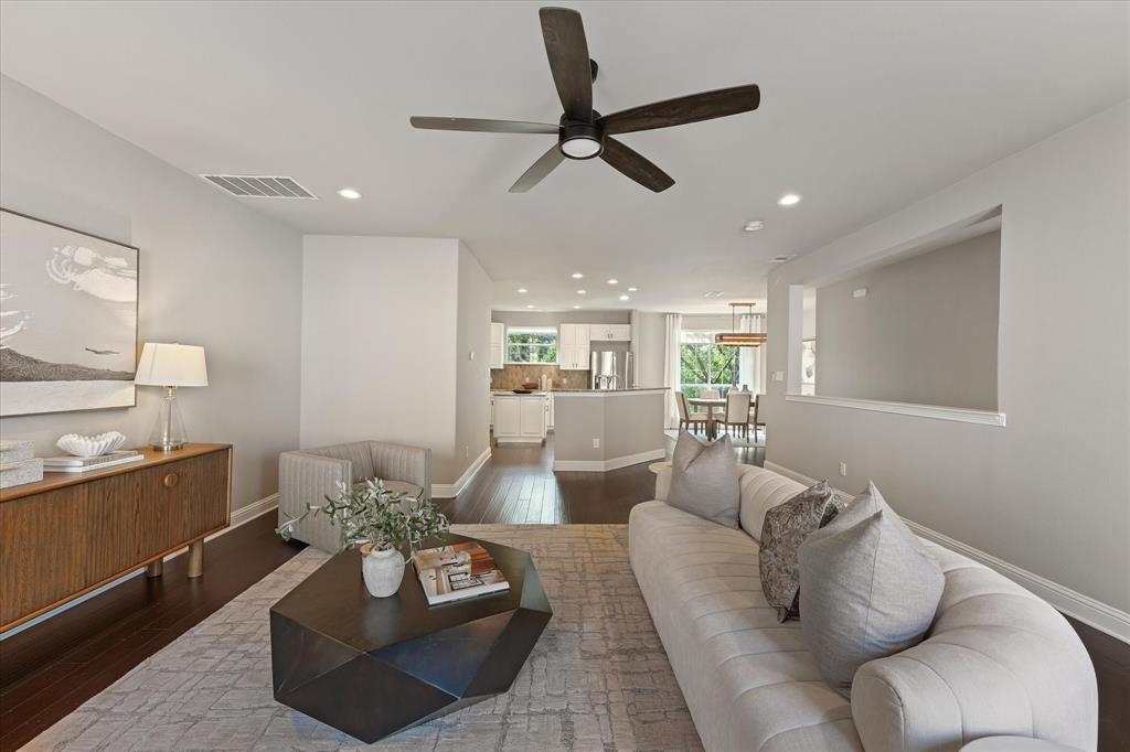 Rarely does an Uptown townhome offer BOTH a panoramic rooftop skyline terrace and a fully fenced private backyard retreat, all just steps from The Central, E Bar, Loro, and some of Dallas’ best dining and entertainment. Freshly painted and move-in ready, this sophisticated 3-story home blends elevated urban living with everyday comfort. The open-concept main level features hardwood floors, abundant natural light, expansive living and dining spaces, and seamless entertaining flow. The rooftop terrace offers panoramic Downtown and East Dallas skyline views with turf
accents and custom wood seating, creating the perfect space to entertain or unwind above the city lights. Down below, the private fenced backyard features a spacious Trex entertaining deck, turf yard, and tree-shaded privacy rarely found in Uptown living.

Upstairs, the vaulted-ceiling primary suite feels expansive and retreat-like with abundant natural light, a custom walk-in closet, oversized shower, and soaking tub. A secondary en-suite bedroom occupies the same level, while the first floor offers an additional bedroom, full bath, utility room, and direct backyard access ideal for guests, roommates, or a home office setup.

Additional features include motorized shades, Honeywell smart thermostats, Ring doorbell system, stainless steel appliances, washer and dryer included, 2-car garage, and multiple indoor-outdoor living spaces designed for both entertaining and functionality. Recent improvements include fresh interior paint, updated turf 2024, new water heater in 2024, and HVAC was replaced in 2023.

A rare opportunity to own a move-in-ready Uptown home delivering skyline views, private outdoor living, walkability, and a lifestyle that stands apart from anything else in the neighborhood.