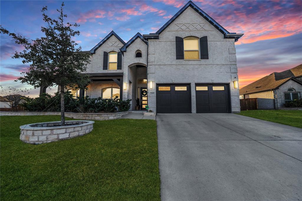 Extensively upgraded with a dedicated home theater media room, built in wet bar, whole home in wall speakers including patio audio, and Cat 6 wired internet throughout, this northeast facing home in the highly desirable Villages of Hurricane Creek offers luxury living with modern efficiency. A fully owned solar panel system to be paid off at closing provides significant energy savings, while smart home features, electric vehicle charging capability, permanent exterior lighting, and transferable builder and HVAC warranties add long term value. Inside, abundant natural light and a dramatic curved staircase create an impressive entry. The open concept layout centers around a bright family room with floor to ceiling windows and fireplace. The chef’s kitchen features quartz countertops, stainless steel appliances including a double oven, extensive cabinetry, oversized island, and a butler’s serving area. The main floor primary suite includes a sitting area and a spa like bath with dual vanities, glass enclosed shower, jetted tub, and walk in closet. A separate downstairs guest suite provides privacy for visitors. Upstairs offers a large game room connected to the media room, plus generously sized secondary bedrooms.