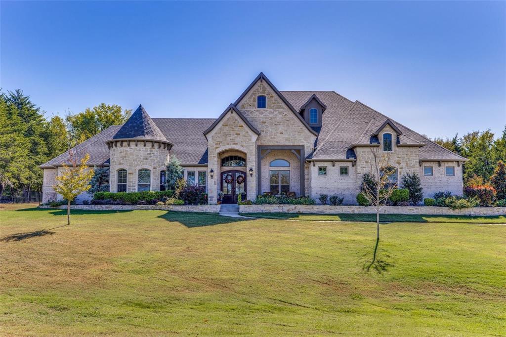 Experience the perfect blend of luxury, privacy & convenience in this exceptional north-facing residence within the highly desirable gated community of Urban Crossing. Situated on an oversized homesite, this meticulously maintained 4-bedroom, 3.5-bath home offers an elevated lifestyle with timeless finishes & an open-concept layout. A grand entry welcomes you into a light-filled interior where soaring ceilings, expansive windows, & rich hardwood floors create an atmosphere that is both elegant & inviting. Designed for seamless entertaining & comfortable everyday living, the spacious floor plan connects the main living areas while maintaining distinct spaces for work, relaxation & gathering. The gourmet kitchen is a true centerpiece, featuring premium stainless steel appliances, a professional-grade gas cooktop, double ovens, & an oversized island. Adjacent dining & living spaces create the ideal setting for hosting family & friends. A private executive study with custom built-ins offers the perfect work-from-home environment, while the formal dining room, game room, & butler's pantry add versatility throughout the home. The expansive primary suite serves as a luxurious retreat, complete with a spa-inspired bath featuring dual vanities, a freestanding soaking tub, an oversized walk-in shower, & an impressive custom closet. Step outside to an inviting covered patio with a fireplace overlooking the expansive backyard. With ample space to entertain, play, or create your dream outdoor oasis, the possibilities are endless. Additional highlights include a three-car garage, designer finishes, abundant storage, & numerous upgrades throughout. Enjoy the serenity of a private gated neighborhood while remaining minutes from major highways, premier shopping, dining, entertainment, & top-rated schools. Offering the rare combination of spacious single-story living, modern luxury, & an unbeatable location, this exceptional home presents a rare opportunity in today's market.