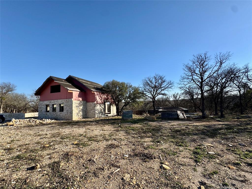 Discover your dream getaway on this stunning 4-acre riverfront property, offering a perfect blend of nature and
potential. Located within the highly acclaimed Brock Independent School District, this unique parcel is ideal for anyone
seeking a serene lifestyle while remaining connected to excellent educational opportunities. The property features a
partially built house, providing a fantastic foundation to create your custom home. With breathtaking views of the river
and lush surrounding landscape, this site offers a peaceful retreat for relaxation and recreation. Imagine mornings
spent sipping coffee on your future porch, listening to the gentle flow of the river, and evenings enjoying the tranquility
of the great outdoors. Whether you envision a cozy home, a weekend escape, or a picturesque homestead, this
expansive land offers endless possibilities. Enjoy easy access to fishing, kayaking, and hiking right from your doorstep
while being just a short drive from local amenities. Don’t miss the chance to make this riverfront property your own!
Embrace the opportunity to build your dream home in a vibrant area where nature meets comfort. Home is approximately 40% complete, flexible design can be finished out with 3 - 6 bedrooms and 3-6 baths, plans available upon request.