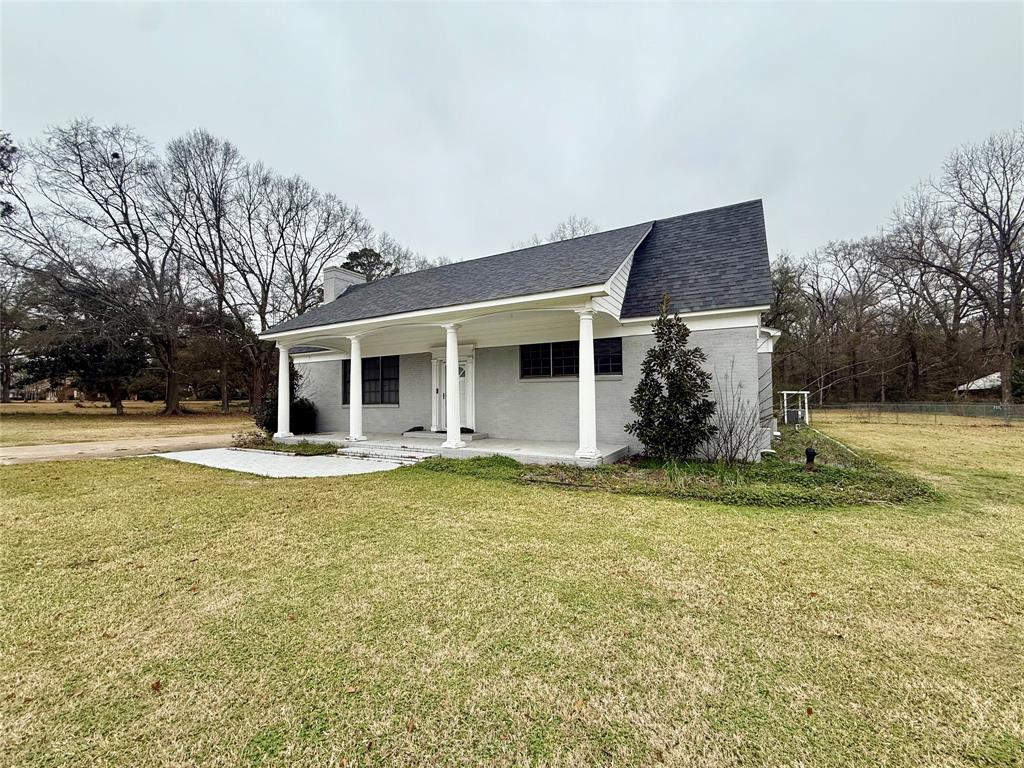 Attention investors or if you just love having a big compound you’re gonna love this place! Located roughly 22 minutes from the new Meta Center this home has multiple specialties about it, for sleeping arrangements. With a living room on separate ends of the house makes it feel like you can live in this house and have your own private living room and bedroom on one end and private living room And bedrooms on the other end. Also has two apartments in the back! The main apartment is huge,  big enough to have two bedroom rooms and comes with a full bathroom and full kitchen! Right this building and behind it, is another apartment that’s a smaller one bedroom one bath apartment! The opportunities are endless here! One of a kind unique home in the heart of Winnsboro! 3 bed 3.5 bath over 4,300 sqft heated! Sitting on a little over 1 Acre! Pull up the long concrete driveway into your private backyard haven. With a line of trees on the left side for privacy and woods in the back and a line of trees on the right side this place is nice and private, like country in the city! Located in one of the best parts of Winnsboro. Inside is an elegant foyer area with a huge.. laundry room room to the right. Walk in through to the main living room and this living is so big you could have it as a dance floor!.. with big windows over looking the beautiful backyard. Go through to the large kitchen with new granite, countertops and updated painting. Each room in this house is huge primary bedroom is 24 x 18! Upfront is a second living room area that is perfect to come sit in and whine down or do some reading. Out back of the house is one of the beauties of this place. It looks like a park back there with huge mature oak trees is the type of place you will not want to leave. There is not just one property here there is a huge guest house, complete with a garage, bathroom, bedroom, living room, and patio. Out from behind that is another.one bedroom little cottage.Great for AirBnB!
