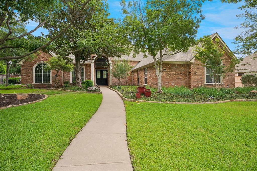 MUST SEE, MOVE IN READY ESTATE!! Come feel at home in this recently renovated estate surrounded by mature trees in a premium lot facing a green belt with easy access to an open field, walking trails that take you to Northfield park and direct sight to neighborhood playground of JB Sandlin Park. Upon entering this exquisite 4 bedroom 4.5 bath estate you are immediately greeted by a grand staircase that leads you to an open living room and or playroom with a wet bar and 2 bedrooms each with their full bath. Stunning white oak wood floors in primary bedroom as well as the main living areas.The grand primary suite with plenty of natural light, private access to the beautiful backyard, double vanity sinks, large shower and a custom walk in closet. Stunning kitchen with stainless steal appliances, large sink with disposal and a built in ice machine that is much needed most of the year! Open floor plan concept makes this home perfect for entertaining and creating family memories. Work in the comfort of your own home with floor to ceiling built in cabinets and a breathtaking view of the front yard and green belt.  Large laundry room with plenty of storage, room for extra freezer and or fridge, counter space, pantry and lots of storage. 3 car garage with epoxy floors, built in cabinets and drawers with sink. The large driveway can also accommodate additional parking if needed. According to the floor plans, an additional bedroom can be added on the second floor.