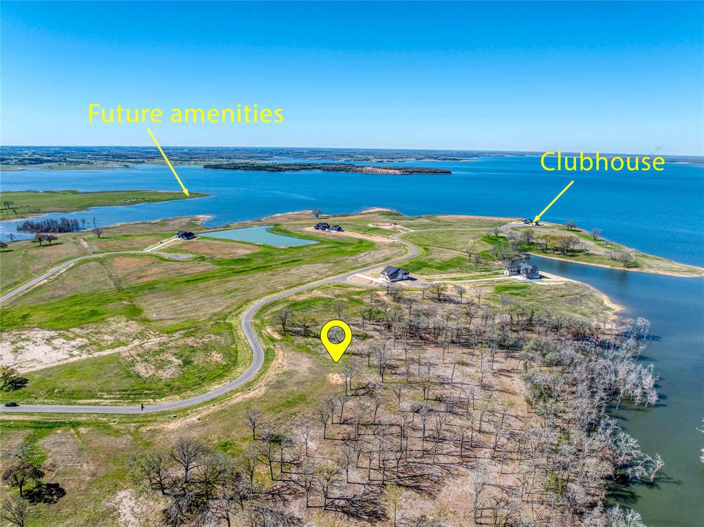Lakefront, 1.38 Acres, Boat Dock Capable, Under $500K.

Welcome to Lot 9, also known as 470 Peninsula Drive, a 1.38-acre lakefront property situated in the gated community of The Peninsula on Bois d’Arc Lake. This wooded homesite features mature trees, natural elevation, and expansive lake views, offering a scenic and flexible space to design your custom home. Located in a bring-your-own-builder community, it provides the freedom to create a property tailored to your lifestyle or investment goals.

Lakefront and boat dock capable, this lot is well-positioned for buyers seeking access to the lake and the ability to personalize their build. Short-term rentals are permitted, making this a strong candidate for either full-time residence, vacation home, or income-producing property.

The Peninsula and The Shores at The Peninsula are the only communities on Bois d’Arc Lake with existing homes, allowing you to tour the neighborhood and experience the growing community firsthand. The development originally sold out in under 30 minutes, an early sign of its strong appeal and long-term value.

Homeowners enjoy access to an impressive lineup of current amenities, including a clubhouse with indoor lounge, kitchen, bar, fitness center, observation deck, infinity-edge pool, putt putt course, and outdoor grilling area. Even more lifestyle features are on the way by Summer 2025, residents will benefit from Phase Two amenities including a community marina, paddleboard and kayak launch, tennis and pickleball courts, fenced dog park, multi-purpose field, and playground.

Conveniently located just 15–20 minutes from the South 1396 Boat Ramp, 470 Peninsula Drive offers scenic views, community convenience, and design flexibility, all under $500K.

*Buyer to verify all information*