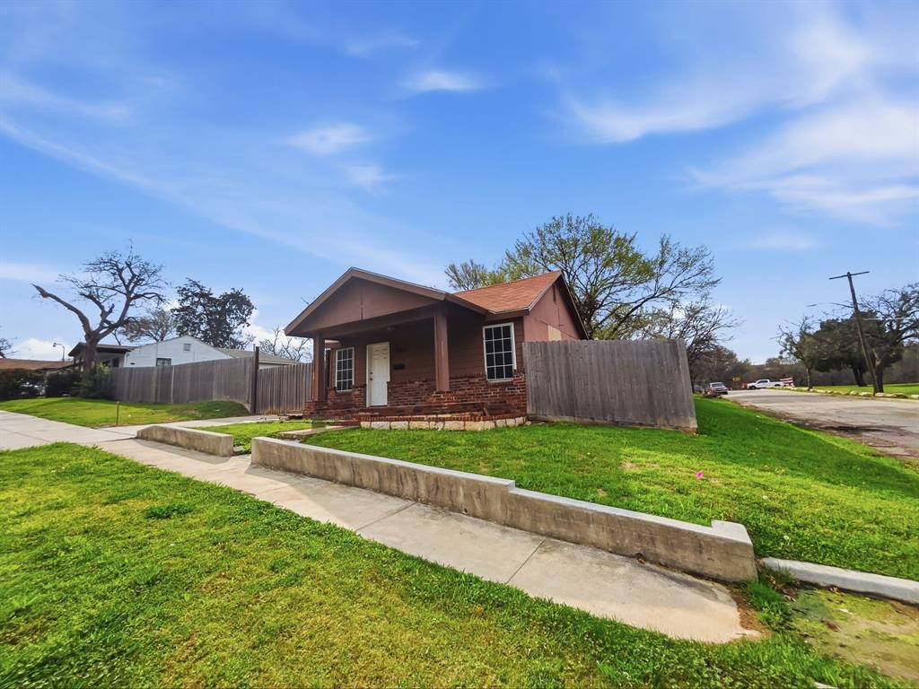3 bedroom, 2 bath home situated on a spacious corner lot in a convenient location. This quaint property offers a comfortable layout with great potential for a first-time homebuyer or investor seeking a rental opportunity. The large yard provides plenty of space for outdoor activities, gardening, or future improvements. Located directly across the street from Titus Paulsel Park, offering easy access to green space and recreation. The home is also just half a mile from Texas Wesleyan University, making it a great option for those looking to live near campus or add a strong rental property to their portfolio. With its desirable location, generous lot size, and investment potential, this property is a fantastic opportunity to make your own or add to your real estate portfolio.

*Stakes in photos show property line and separation from other lot.