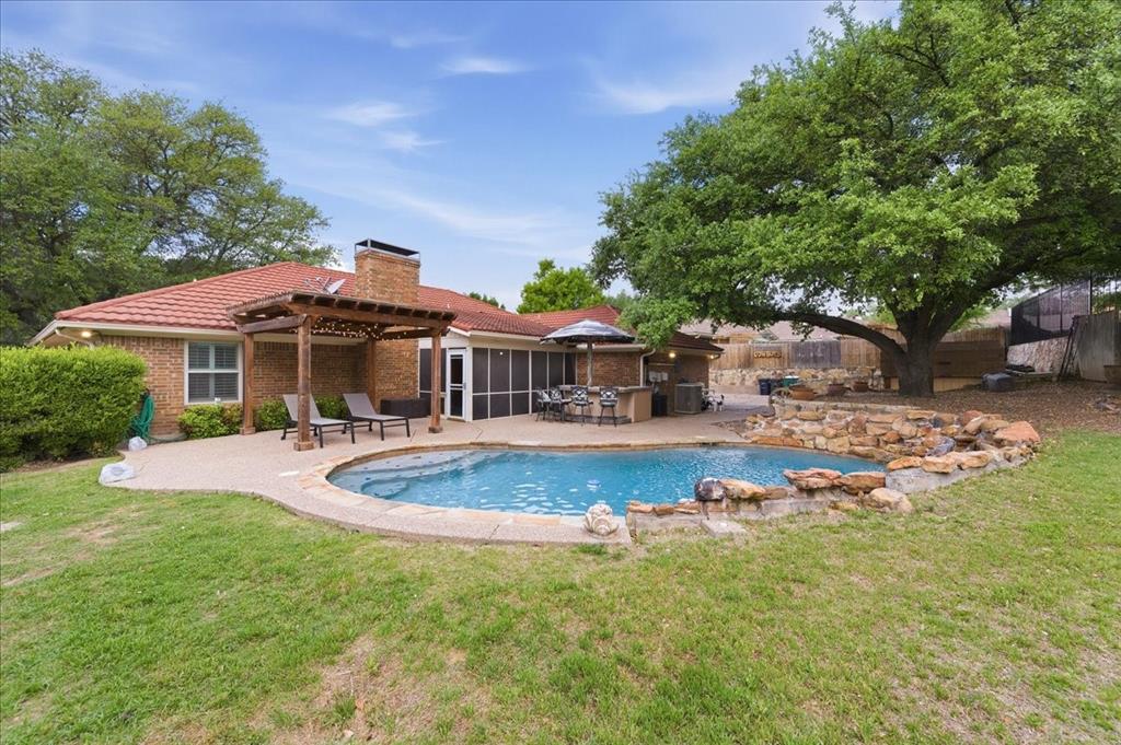 Welcome home to this single-story 4-bedroom, 2.5 bath home with a swimming pool where everyday living feels like a vacation. Nestled in the sought-after Lake Country Estates neighborhood.  Formal Dining could be flex space or office.  4th bedroom has a pocket door with a closet - could be flex space or office.  This home has laminate floors throughout the living areas and bedrooms, and tile in the kitchen and dining room.  Updated kitchen appliances, including the refrigerator. Additionally, you'll enjoy plantation shutters throughout, an outdoor kitchen and pergola with lights and an extended driveway for extra parking.  Enjoy your own private oasis at the sparkling pool with two water features.  Host unforgettable gatherings under the pergola or fire up the outdoor kitchen, all within a landscaped yard accented with stylish rock edging along the front and sides.  The 2-car garage offers ample storage and convenience.  Outdoor kitchen thatch roof is being replaced, on order.

Optional membership to the Voluntary HOA unlocks access to a community boat dock and additional amenities — making this home ideal for those who love the water and outdoor lifestyle.