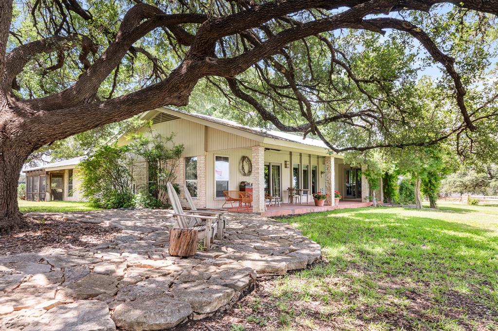 Tucked away in the rolling hills of Spicewood, Texas, Otra Vez Ranch is a rare 434 acre recreational escape that offers the perfect balance of natural beauty, Hill Country heritage, and proximity to Austin. Since its acquisition in 1989, this storied property has been a beloved family retreat - a place where generations have gathered to ride horses, raise cattle, hunt, hike, swim, and, more recently, care for their small herd of zebras.

A landscape rich in diversity, the ranch unfolds with dramatic views, spring-fed grottos, and wide pastures teeming with wildlife. From fossil hunting to fireside evenings beneath the oaks, Otra Vez is more than a ranch - it's a place to return to again and again.

Location

Perfectly positioned for both privacy and accessibility: 
- 37 miles - 45 minutes to Austin
- 16 miles to Marble Falls
- 21 miles to Horseshoe Bay
- Nearby attractions include Lake Travis, boutique wineries, acclaimed distilleries, and some of the Hill Country’s best dining and entertainment.

Land & Water

The terrain is nothing short of enchanting. With 280 feet of elevation change, Otra Vez Ranch reveals sweeping vistas, rolling pastures, and a network of gullies and wooded ridges. Carefully managed through decades of stewardship, the land is both scenic and functional:
- Native oaks and grasses dominate the landscape, with cedar cleared selectively to enhance grazing and preserve wildlife habitat 
- Fenced into 3 primary pastures, with a 4th near completion
- Brackett-Real and clay loam soils support a rich ecological foundation
- Extensive road and trail system allows for seamless access throughout

Water is abundant and diverse:
- 3 natural springs feed grottos, swimming holes, and a seasonal creek
- 2 water wells supply the homes and a large concrete stock tank-turned-swimming-pool
- Little Cypress Creek, a seasonal tributary, winds across the north end of the property
