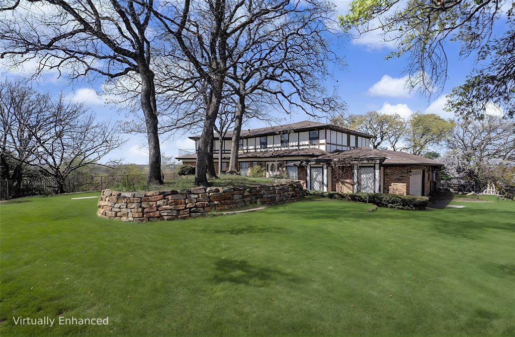 Rare opportunity to own one of the most unique lots in Arlington! Tucked away on an expansive approx. 0.7-acre cul-de-sac lot at the top of the hill, this large 3-story home offers incredible panoramic views, wooded privacy, and endless potential for investors, builders, or buyers looking to create a one-of-a-kind custom residence. The home features a spacious open layout with oversized windows positioned to capture the scenic surroundings and elevated views. Surrounded by mature trees and set on a rare oversized lot, this property provides a private retreat-like setting while still being conveniently located near city amenities.

Whether you are an investor searching for your next high-upside project or a homeowner wanting to design and personalize your dream home, the possibilities here are truly endless. Opportunities for lots of this size, privacy, and elevation are extremely rare in Arlington. Conveniently located with quick access to I-20, HWY 287, and major Arlington entertainment, shopping, and dining destinations.

Property is being sold AS-IS. Seller will make no repairs. Buyer and buyer’s agent to verify all information including square footage, schools, zoning, restrictions, lot dimensions, and property condition.