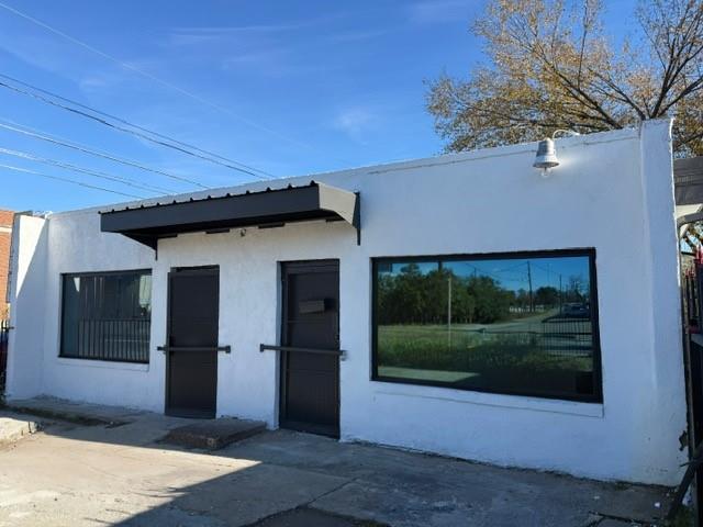 Commercial property on corner lot in the up-and-coming Fair Park area!!!  North facing property just 3 blocks away from Fair Park with the Dallas skyline in sight.  Building was previously 2 split in half with 2 storefronts, but due to the condition it has been gutted and is now a shell space.  New metal roof, new gutters, new windows, and new electrical panel. Iron fence around parking lot installed.  The City of Dallas currently has plans for the South Dallas - Fair Park initiative program to revitalize the area.  Get in early and watch the area grow!