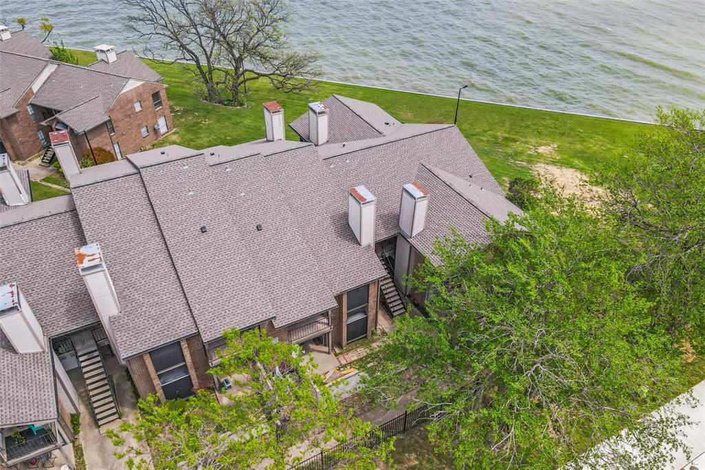 Experience relaxed lakeside living in this beautifully updated condo, located just steps from Lake Ray Hubbard! Combining comfort, convenience, and a highly desirable location, this inviting home offers an excellent opportunity for full-time living, a weekend retreat, or an investment property.

Inside, you'll find a spacious primary bedroom along with tasteful updates throughout that create a fresh, modern feel while maintaining warmth and comfort. The functional layout and welcoming atmosphere make the space easy to enjoy and easy to call home.

Living near the lake means outdoor recreation, scenic walking paths, waterfront dining, and peaceful water views are just moments away. Whether you enjoy morning walks by the water, boating, dining nearby, or simply appreciating the surroundings, this location offers a lifestyle that’s hard to beat.

Conveniently situated near I-30 and George Bush Turnpike, this property provides quick access to Dallas while remaining close to shopping, dining, and entertainment in Rowlett and Rockwall. Enjoy low-maintenance living in a location that offers both everyday convenience and the charm of lakeside living.