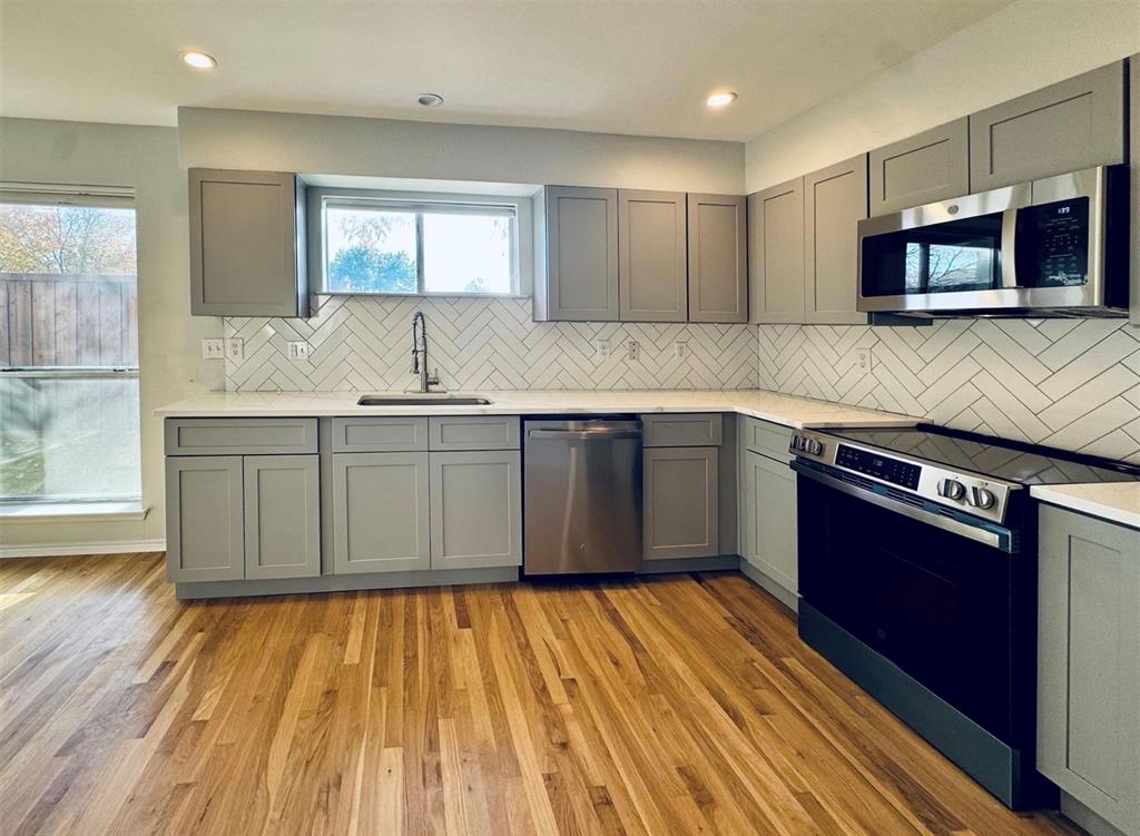 Perfectly positioned in one of Dallas’ most walkable and highly sought-after neighborhoods, this first-floor 2-bedroom, 2-bath condo offers effortless access to the city’s best dining, shopping, and everyday conveniences. Located just steps from Drake’s, José, Lovers Seafood, Trader Joe’s, and Inwood Village, everything you love about city living is right outside your door.

Inside, the open, light-filled layout is designed for easy living. Large windows throughout flood the space with natural light, while the recently updated kitchen features new cabinetry and modern appliances, opening seamlessly to the living and dining areas. The bedrooms and closets are generously sized, including a true primary suite with its own private bath and a sliding glass door that opens to a serene water feature—an unexpected and peaceful retreat rarely found in condo living. Real hardwood floors span the common areas, with carpeted bedrooms and tile in the bathrooms. Washer, and dryer convey, making this a truly move-in-ready home.

The community is clean, quiet, and well-managed, with lush landscaping and a beautiful pool that creates a tucked-away feel in the heart of the city.

This is more than a condo—it’s a lifestyle. Enjoy the rare combination of privacy, walkability, and thoughtful updates in one of Dallas’ most established and steadily appreciating neighborhoods. From quiet mornings in a light-filled home to evenings just steps from premier dining and shopping, Unit 119 offers a polished urban living experience in a location that continues to hold—and grow—its value.