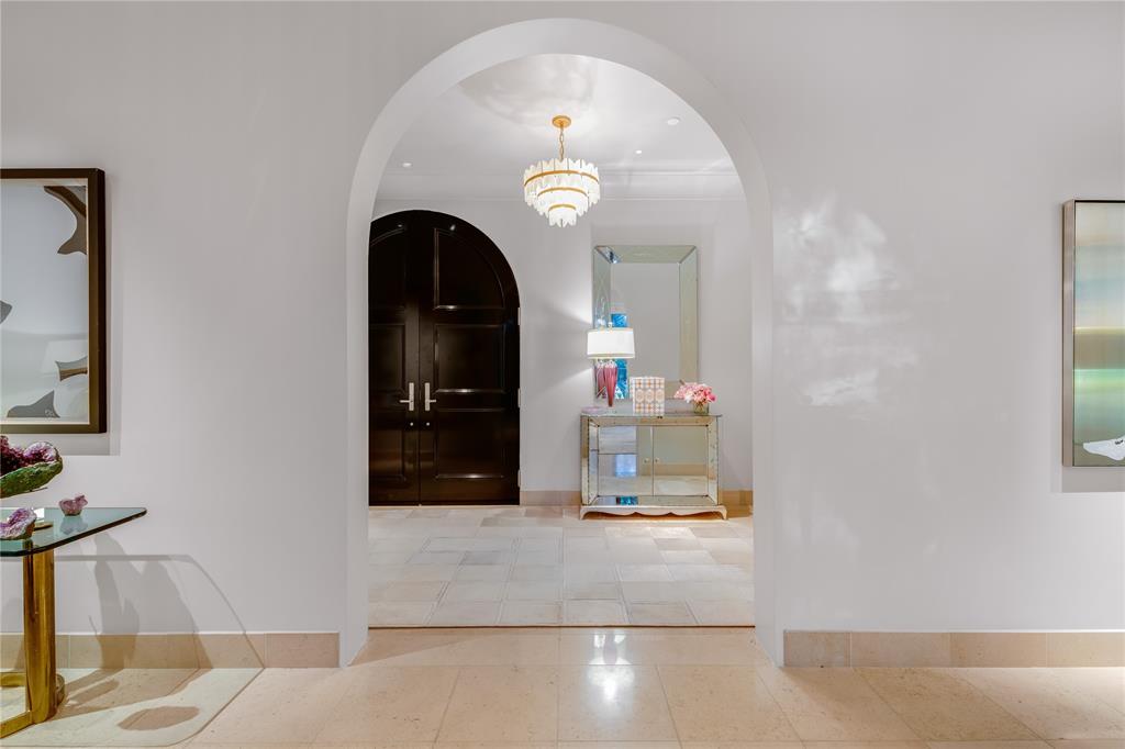 Rare opportunity awaits at the Mansion Residence, one of Dallas’ most exclusive high-rises. Unit 2E is expansive at 4,200+ SF and an architectural tour de force. The residence tells a story of exclusivity, and is truly a unique and coveted home.

Renovated in 2022 under the guidance of Schutts Magee & Riddle Architects and renowned designer Jan Showers, every detail exudes elegance. Including high, cove ceilings, Bulthaup kitchen, heated marble floors, and motorized shades.

The private terrace is exceptionally large by high-rise standards, and larger than most other units in the building. Reminiscent of a secluded, tranquil San Miquel courtyard, it’s perfect for entertaining, relaxing, and even yoga.

With 24-7 room service, concierge, and valet, and only 24 residences in total, exclusivity is at its peak at the Mansion Residences. Square footage includes terrace