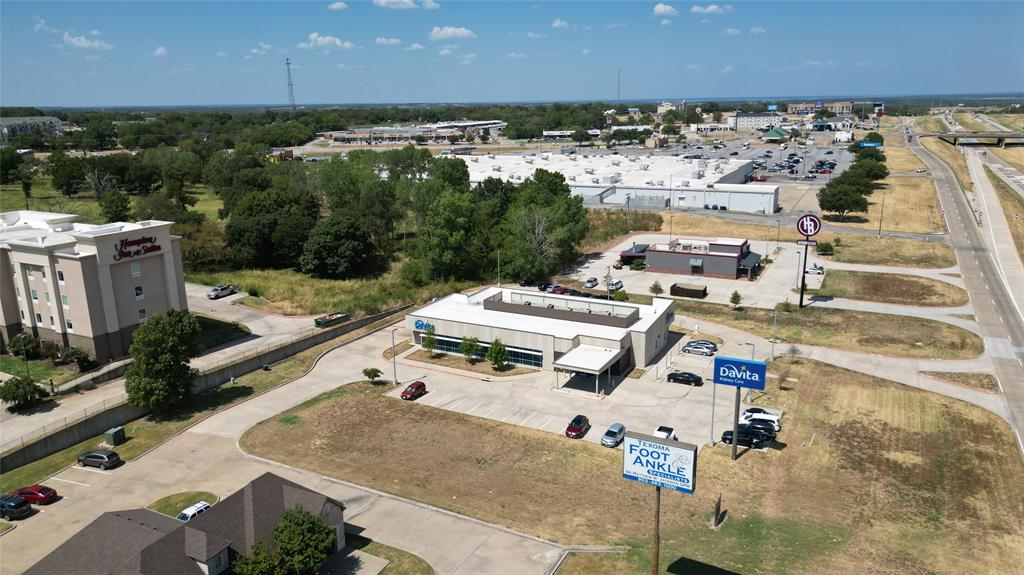 HWY 75 ACCESS ROAD FRONTAGE, this tract of land already has cross access easements in place from Texoma Foot Clinic on the south and DaVita Dialysis on the North.  If you are looking for a super nice small - ready to build on tract of land in one of the fastest growing areas in North Texas, you may have just located it.  Medical, retail, dining, within walking distance, Ford and the new Classic Chevrolet just south with Walmart, Starbucks, Chic Filet, Jack in the Box, McDonalds, Taco Bell, Panda Express, c stores, numerous hotels and so much more within .05 miles.  Survey in documents, don't miss this great opportunity in fast growing Denison TX! 
City of Denison stated access will be off of Hwy 75 access rd for this property, currently access off of Ansley behind Texoma Foot and Ankle.