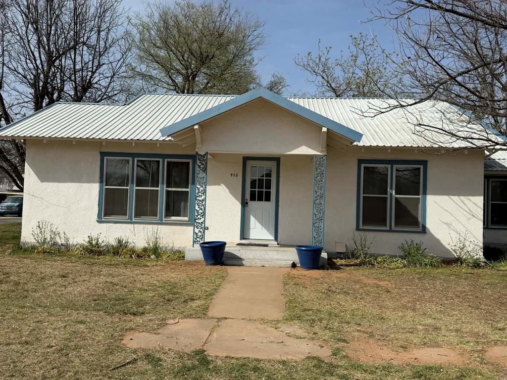 Charming & Move-In Ready on a Corner Lot, Turnkey Home or Investment Opportunity!

Welcome to this delightful 2 bedroom, 1 bathroom home nestled on a spacious corner lot with mature trees and undeniable curb appeal! Whether you're looking for a cozy place to call home or a ready-made investment, this property checks every box.

Step inside and you'll find a large, open living area with plenty of natural light and room to relax. The beautifully updated kitchen features beautiful cabinetry, granite countertops, a tile backsplash, hardwood flooring, and stainless steel appliances and yes, everything stays! Both bedrooms are generously sized, offering comfort and versatility for any lifestyle.

Outside, enjoy the oversized corner lot with a detached garage perfect for extra storage, a workshop, or additional parking. The classic stucco exterior with a durable metal roof and charming blue accents gives this home a timeless, well-maintained look.

Currently operating as a successful Airbnb, this property is fully furnished and turnkey, all furniture and appliances convey with the sale. Move your family right in or continue generating income from day one!
Highlights:

2 Bed - 1 Bath - Detached Garage
Corner lot with mature trees
Updated kitchen with granite countertops & stainless appliances
All furniture and appliances included
Currently operating as an Airbnb — income-producing from day one
Metal roof - Central HVAC
Move-in ready!
Don't miss this incredible opportunity — schedule your showing today!