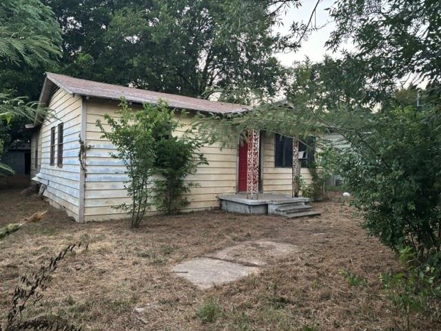 CALLING ALL INVESTORS.  Here is your chance to stake your claim to a peaceful neighborhood that is undergoing rehabs, teardowns, and new builds.
Directly across from River Ranch Texas Horse Park.  Large lot.  House needs everything, but foundation and structure are there. 2 storage buildings in back, one with electric and water hookups.  Cash or Hard Money only.  Owner looking for quick close.  BRING ALL OFFERS.