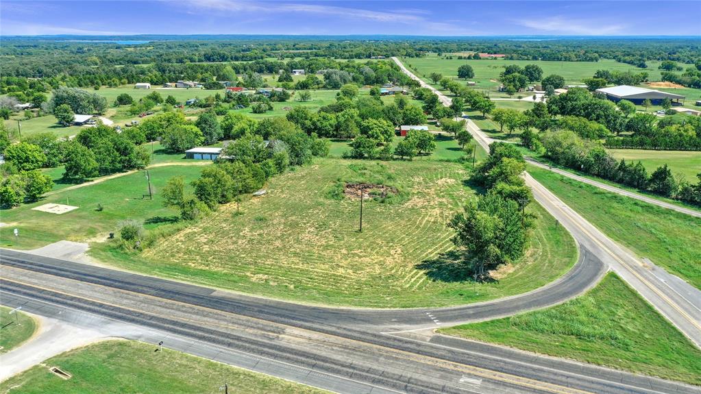 Incredible Investment Opportunity in Gordonville, Texas! Discover this prime 1.984-acre tract ideally situated at the intersection of Highway 377 and FM 901, just minutes away from the stunning Lake Texoma and the prestigious Rock Creek Golf Course. This flat and super buildable land is perfect for a commercial business, offering fantastic visibility.Utilities are accessible, with water service provided by Northwest Grayson Water (WCID Number 1); however, there is no water meter in place. The buyer will need to arrange electricity through GCEC. Seize this opportunity to call for your very own private showing today....