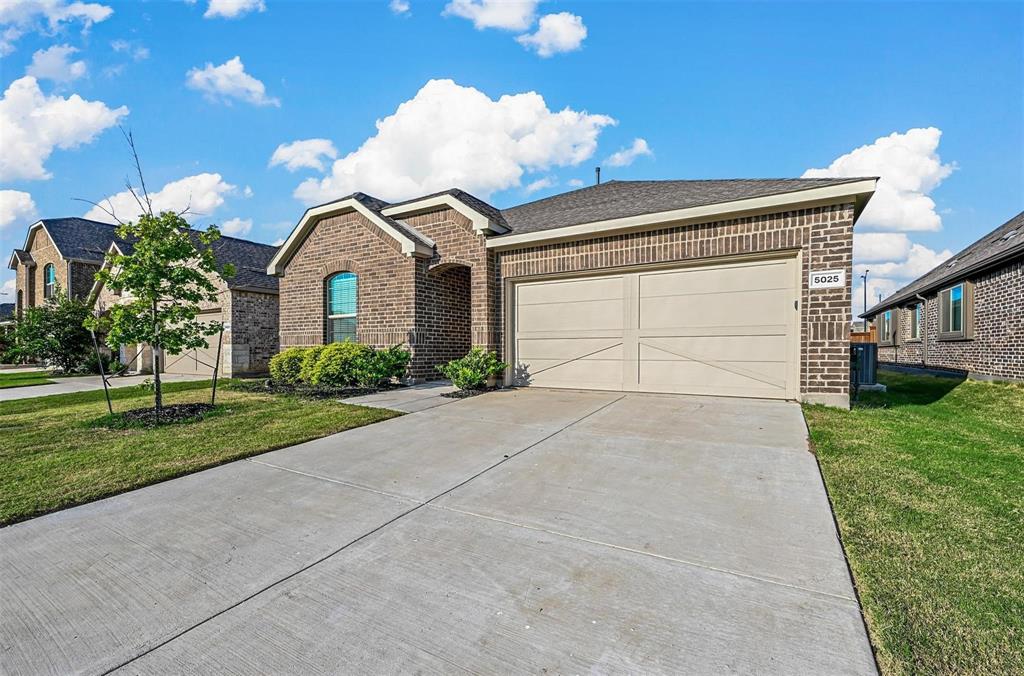 Perfectly situated, 4 bed home in Sutton Fields is waiting for new owners! This beautiful home features an open, eat-in kitchen with large breakfast bar, island, and gas stove for chef level cooking. Modern colors throughout and no carpet. This home has a bonus space that can be office, formal dining, or second living nook.  The primary suite features large walk in closet and double vanity. Come tour this gem today!