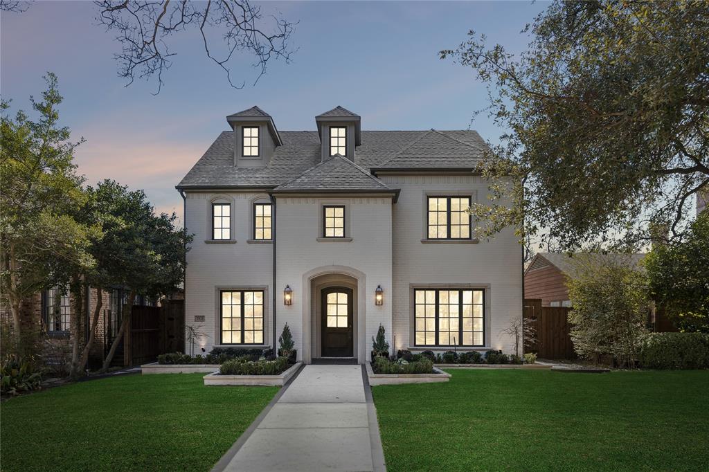 Park Cities Showstopper — Custom Luxury at Its Finest! This exceptional custom-built smart home offers refined elegance, modern comfort, and pristine condition throughout. Located in Highland Park ISD, this light-filled 4-bedroom, 4.5-bath residence is thoughtfully designed for both everyday living and sophisticated entertaining. A striking entry is flanked by a formal dining area and an elegant study. The welcoming living room features a stately fireplace and opens to a covered patio with an additional outdoor fireplace, creating an effortless indoor-outdoor flow. A stylish dry bar complements the entertaining spaces, while the chef’s kitchen impresses with premium appliances, abundant prep space, large island with seating, a butler’s pantry with wine refrigerator, and a spacious walk-in pantry. The serene primary retreat showcases a spa-inspired ensuite with dual vanities, a large soaking tub, separate shower, and a custom walk-in closet. Generously sized secondary bedrooms each offer ensuite baths and walk-in closets for exceptional comfort and privacy. Approximately 900 square feet of combined unfinished expansion space across the second and third floors provides outstanding flexibility for future living areas, a media room, or additional suites. Outdoors, enjoy a beautifully heated saltwater pool, a small grass area, and an electronic rear gate for privacy. The three-car garage includes two tandem spaces (front to back), plus an additional bay. A side garage door opens directly toward the backyard pool, allowing the door to be raised to create a large, covered entertaining space on the epoxy-finished floor—perfect for hosting poolside gatherings. This highly energy-efficient smart home offers remote control of lighting, pool systems, irrigation, alarm, locks, thermostat, and garage door, delivering luxury that is as functional as it is stunning.