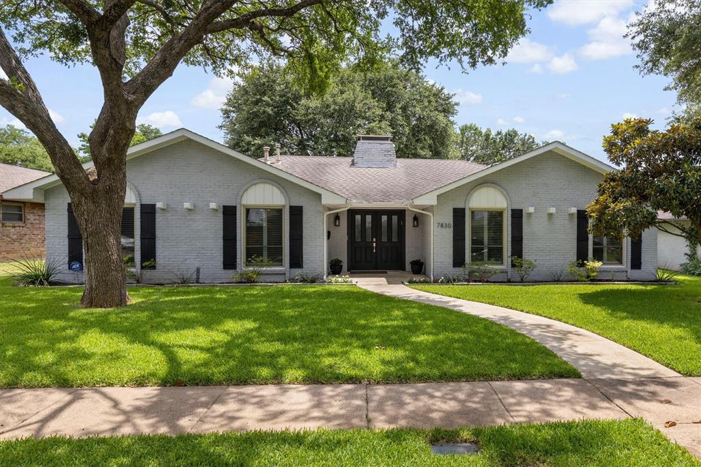 Nestled on a beautifully tree lined street and located within highly sought after Richardson ISD, this single story home combines timeless charm with modern sophistication. Outstanding curb appeal welcomes you to a covered front porch and inviting foyer, setting the stage for all this home has to offer. Remodeled in 2018, walls were removed to create an open, contemporary floor plan featuring 4 bedrooms, 2.5 baths, and two spacious living areas. The chef's kitchen is the heart of the home, boasting 2 dishwashers, stainless steel appliances, granite countertops, an oversized island, pantry, and a convenient coffee or wine station. The family room showcases a brick fireplace, perfect for entertaining or cozy evenings at home.
Recent improvements include plantation shutters, a water heater replaced in late 2018, new HVAC in 2019, and an upgraded sewer line. Step outside to enjoy the expanded covered deck overlooking a large grassy backyard shaded by a mature tree, ideal for outdoor gatherings and play. A sliding electric gate enhances privacy while providing additional secured parking. This move in ready home offers the perfect blend of style, comfort, and functionality in a prime location close to shopping, dining, and major commuting routes.
