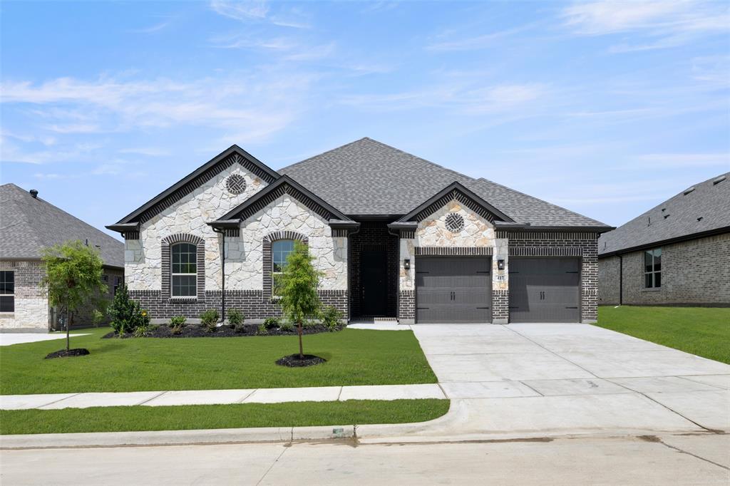 MLS# 20976868 - Built by Sandlin Homes - Ready Now! ~ Our Westwood plan with 3 bedrooms, 2.5 bathrooms, a study, barrel ceiling entryway, open living area, fireplace, and a covered patio. This home is designed with 3cm granite countertops, painted cabinets, wrapped island, upgraded carpet, tile and laminate flooring, and upgraded fireplace tile.
