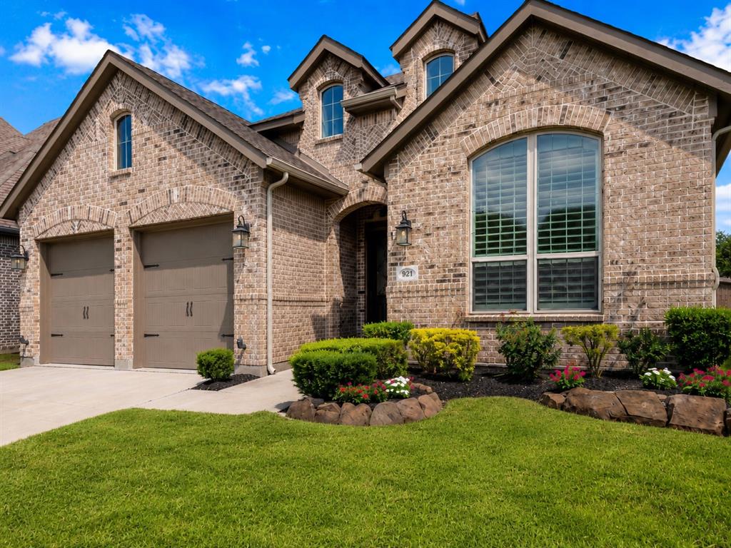 Welcome to 921 Hubbards Creek Trail, located in the highly desirable Trinity Falls community! Backing to a community walking trail with no neighbors directly behind, this beautifully designed one-story home offers a private backyard setting and the perfect blend of comfort, style, and functionality. The home features 3 bedrooms, 2.5 bathrooms, a dedicated media room, and a versatile home office or flex space ideal for a gym, hobby room, or additional workspace.
Inside, the open-concept floor plan is bright, spacious, and thoughtfully designed for both everyday living and entertaining. The large kitchen opens to the family room and features abundant storage and a generous center island, creating an inviting gathering space for family and friends. Custom-feeling details help set this home apart, including plantation shutters throughout, impressive 13-foot ceilings, solid-core doors for added quiet and a more substantial feel, and an extended garage with oversized garage doors that can accommodate a full-size pickup truck. The private primary suite offers a peaceful retreat with a spacious bath, walk-in closet, and excellent storage. Enjoy movie nights in the dedicated media room, stay productive in the private home office, or use the flexible bonus room as a fitness space, hobby room, or additional work area. Located in Trinity Falls, one of McKinney’s most sought-after communities, residents enjoy resort-style amenities, scenic walking trails, parks, pools, lakes, and a welcoming neighborhood atmosphere. Don’t miss the opportunity to call this exceptional one-story home yours! Ask about Orchard Mortgage financing incentives, including rate reductions and a no-fee refinance program for qualified buyers. Contact listing agent for details and eligibility information. Buyer and buyer’s agent to verify all information, including schools, measurements, taxes, and restrictions. Information deemed reliable but not guaranteed. Buyer to perform their own due diligence.