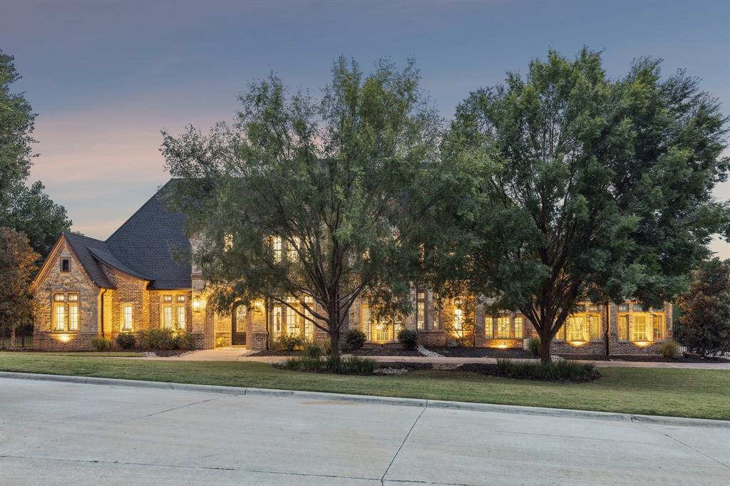 Welcome home to this immaculate home in the coveted Reserve of Southlake, recently remodeled with impeccable finishes and home upgrades. Impressive design and luxurious finishes abound in this spacious, light & bright home. Enter to spacious conversation & entertaining areas complete with Bar and Wine room, and then proceed to the open plan Kitchen-Breakfast-Family room. The Kitchen is a Chef's delight with 2 islands, floor-to-ceiling cabinetry, gorgeous cabinetry, new counters & backsplash. The custom Prep Pantry provides abundant storage space + an extra oven. The large Family room has a modern fireplace, elegant custom beams & walls of windows to enjoy picture-perfect views of the pool and spacious backyard. The Breakfast Room has been upgraded with folding doors for easy indoor-outdoor living. A spacious Media room is also downstairs for everyone to enjoy, along with an Executive Study, and private Primary Retreat with large upgraded Spa Bath and custom Closet with closed cabinet fronts.  The Guest Bedroom & completely renovated Laundry room designed for family organization are also on the 1st floor. Upstairs boasts spacious 3 bedroom suites, an oversized Game room with wet bar + an upstairs Laundry. The 1+ acre lot features a backyard oasis with covered living with fireplace, gorgeous sparkling pool, spa & tons of grass area for play and activities.  New  GAF impact resistant Class 4 roof and new oversized gutters installed 09-2025. Truly move-in ready!